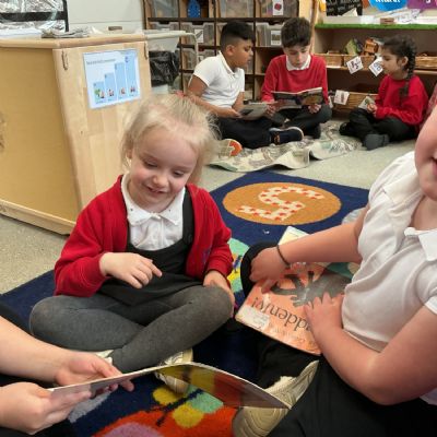 Reading with our Reception Buddies